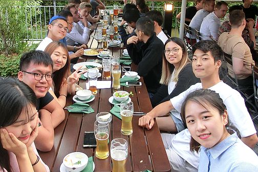 International students eating together 