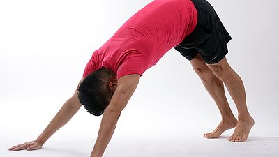 a man doing Pilates exercises